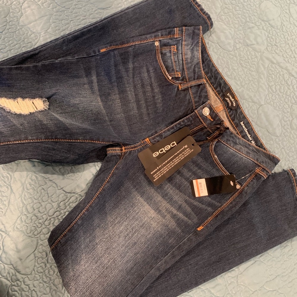 Distressed Bebe skinny jeans - size 26 - brand new!